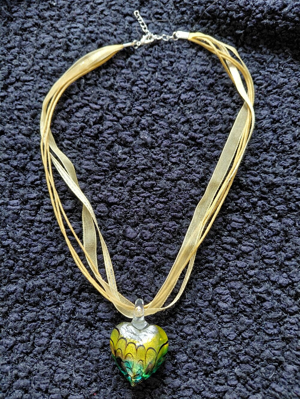 Gold Ribbon Necklace with Green Glass Heart Pendant